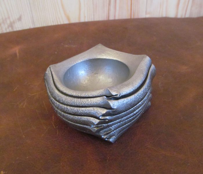 Hand forged metal bowl