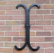 Hand forged iron pattress plate barn wall tie